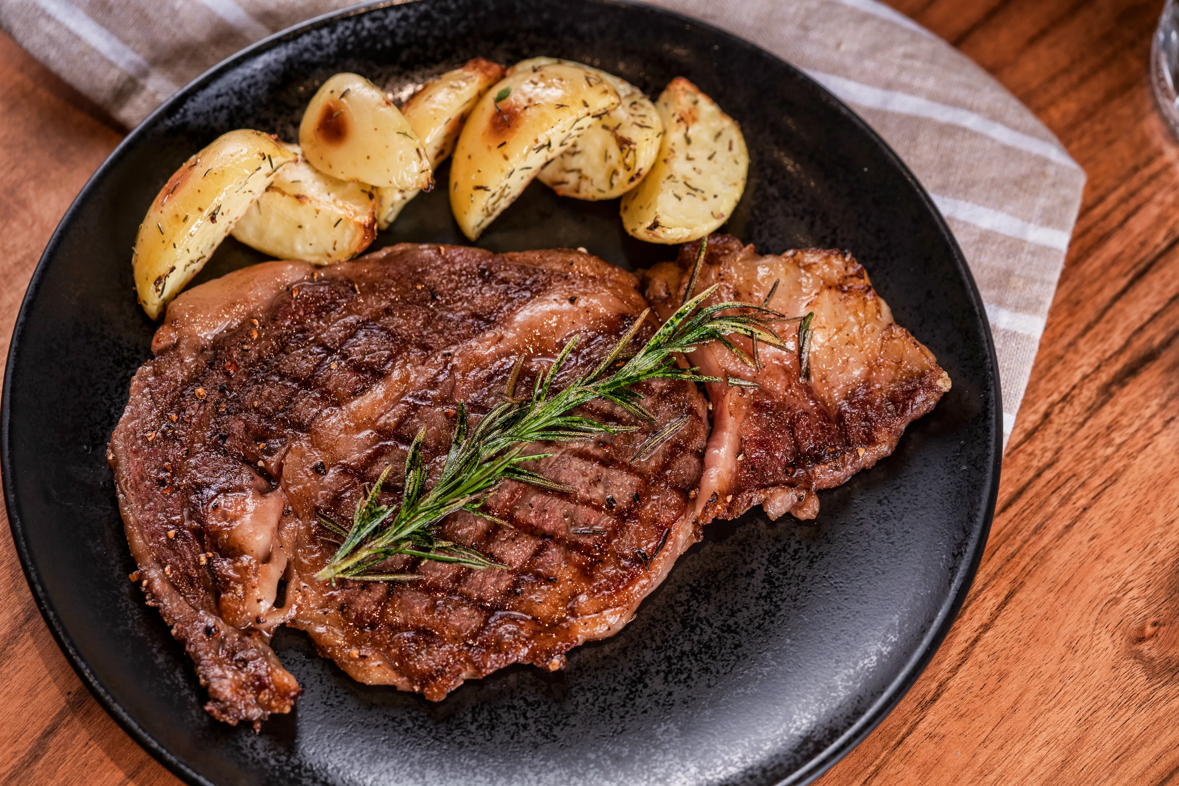 Herb-Grilled Beef Steak with Thyme Roasted Potatoes